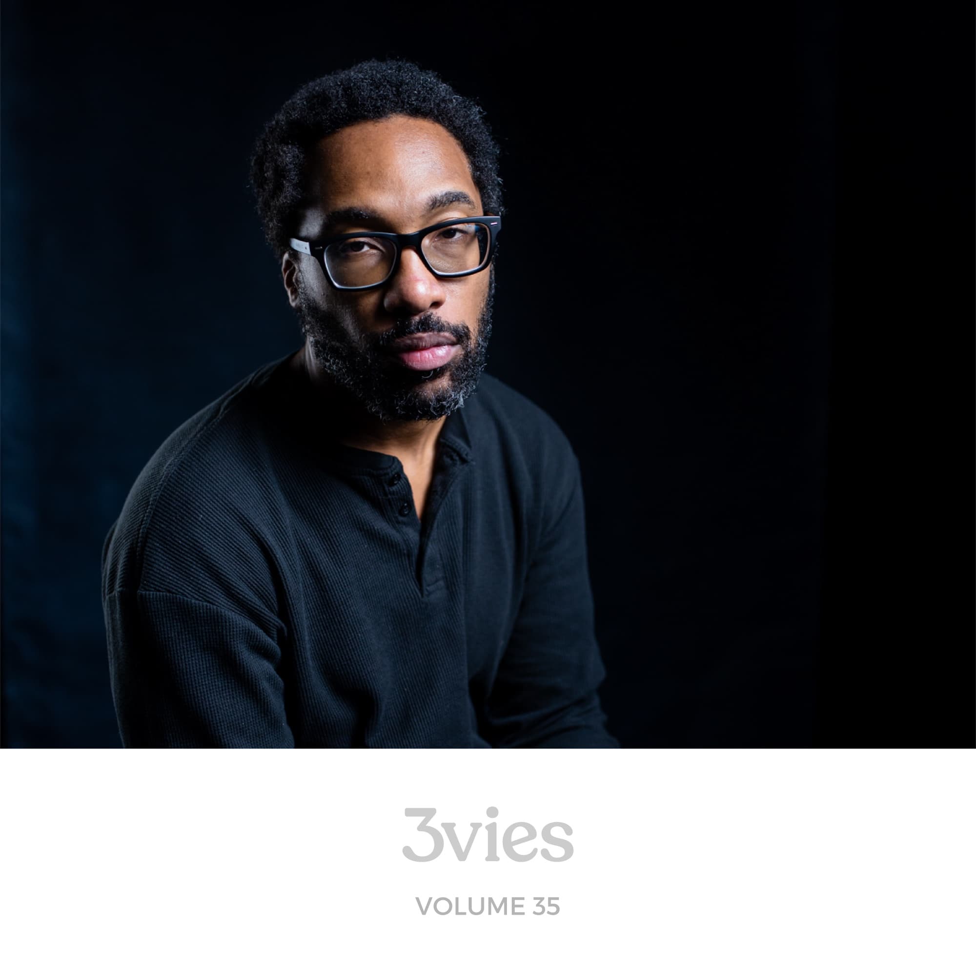 Spotify playlist cover for 3vies Volume 35, featuring the cover portrait of a man in glasses and a dark sweater on black.